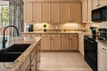 Kitchen amenities include a Refrigerator, Stove, Coffee Maker, Microwave, Toaster, Fully Stocked Cookware and Dishwasher